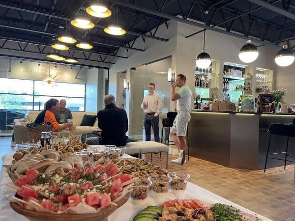 Managing Partner Todd Moss, Director Eric Babcock, and Director Brian Stone, spend some time on the top floor of our office chatting with their clients